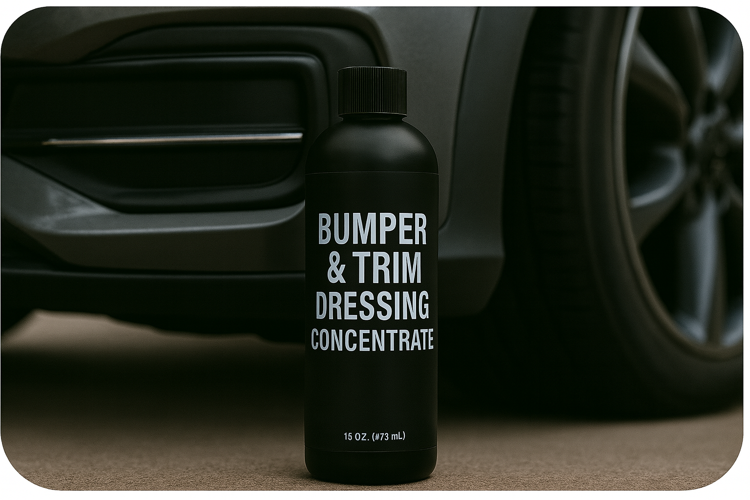Bottle of bumper and trim dressing concentrate in front of a car.